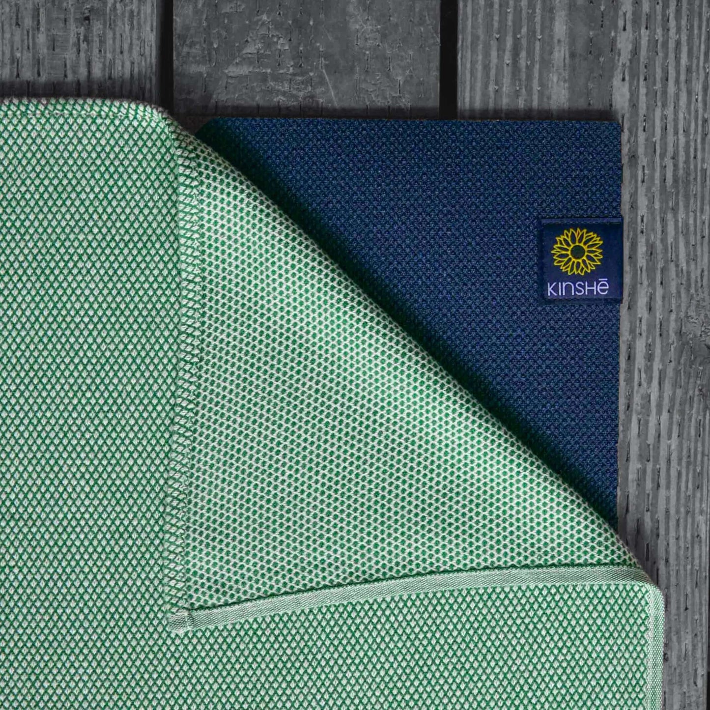 A jewel forest green color swatch of Kinshē Yoga's premium Turkish cotton yoga towel.
